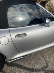 2000 BMW M Roadster in Titanium Silver Metallic over Imola Red & Black Nappa