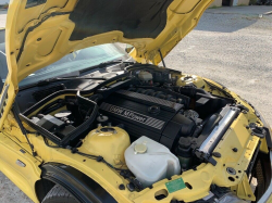 2000 BMW M Roadster in Dakar Yellow 2 over Black Nappa