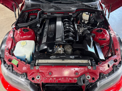 2000 BMW M Roadster in Imola Red 2 over Black Nappa