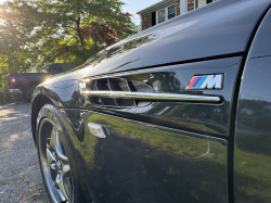 2000 BMW M Roadster in Cosmos Black Metallic over Imola Red & Black Nappa