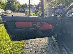 2000 BMW M Roadster in Cosmos Black Metallic over Imola Red & Black Nappa