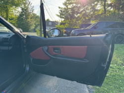 2000 BMW M Roadster in Cosmos Black Metallic over Imola Red & Black Nappa