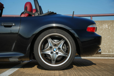 2001 BMW M Roadster in Black Sapphire Metallic over Imola Red & Black Nappa