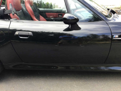 2002 BMW M Roadster in Black Sapphire Metallic over Imola Red & Black Nappa