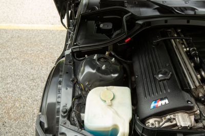 2002 BMW M Roadster in Black Sapphire Metallic over Imola Red & Black Nappa