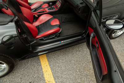 2002 BMW M Roadster in Black Sapphire Metallic over Imola Red & Black Nappa