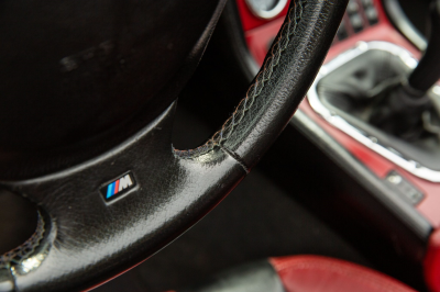 2002 BMW M Roadster in Black Sapphire Metallic over Imola Red & Black Nappa