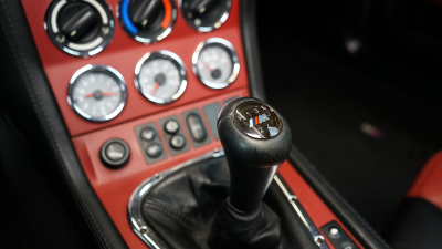 2002 BMW M Roadster in Titanium Silver Metallic over Imola Red & Black Nappa