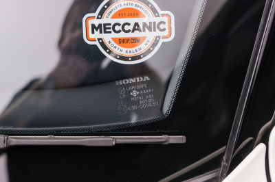 1995 Acura NSX in Grand Prix White over Red