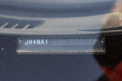 1991 Acura NSX in Formula Red over Ivory