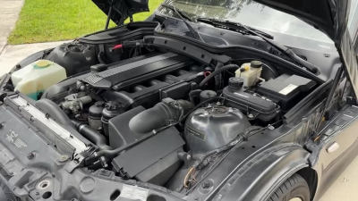 2001 BMW Z3 Coupe in Black Sapphire Metallic over Extended Beige