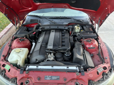 2001 BMW Z3 Coupe in Siena Red 2 Metallic over E36 Sand Beige