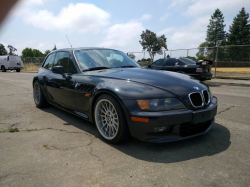 1999 BMW Z3 Coupe in Cosmos Black Metallic over Extended Walnut