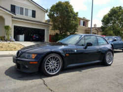 1999 BMW Z3 Coupe in Cosmos Black Metallic over Extended Walnut