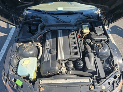 1999 BMW Z3 Coupe in Jet Black 2 over E36 Sand Beige