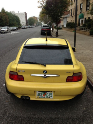 2001 BMW Z3 Coupe in Dakar Yellow 2 over Extended Dream Red