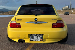 2001 BMW Z3 Coupe in Dakar Yellow 2 over Extended Dream Red