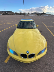 2001 BMW Z3 Coupe in Dakar Yellow 2 over Extended Dream Red