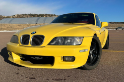 2001 BMW Z3 Coupe in Dakar Yellow 2 over Extended Dream Red