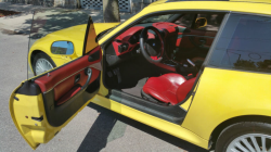 2001 BMW Z3 Coupe in Dakar Yellow 2 over Extended Dream Red