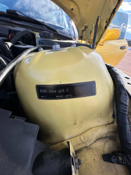 2001 BMW Z3 Coupe in Dakar Yellow 2 over Extended Dream Red