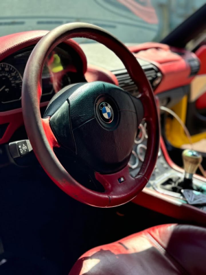 2001 BMW Z3 Coupe in Dakar Yellow 2 over Extended Dream Red