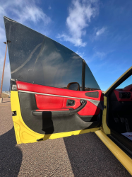 2001 BMW Z3 Coupe in Dakar Yellow 2 over Extended Dream Red