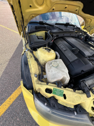 2001 BMW Z3 Coupe in Dakar Yellow 2 over Extended Dream Red