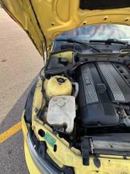 2001 BMW Z3 Coupe in Dakar Yellow 2 over Extended Dream Red