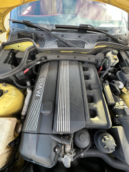 2001 BMW Z3 Coupe in Dakar Yellow 2 over Extended Dream Red