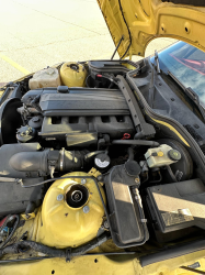 2001 BMW Z3 Coupe in Dakar Yellow 2 over Extended Dream Red