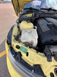 2001 BMW Z3 Coupe in Dakar Yellow 2 over Extended Dream Red