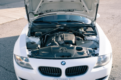 2007 BMW Z4 M Coupe in Alpine White III over Imola Red Nappa