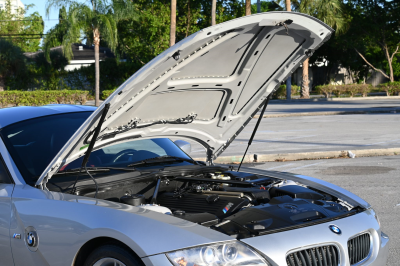 2007 BMW Z4 M Coupe in Titanium Silver Metallic over Imola Red Nappa