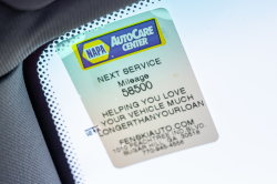 2008 BMW Z4 M Coupe in Alpine White III over Imola Red Nappa