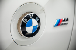 2008 BMW Z4 M Coupe in Alpine White III over Imola Red Nappa