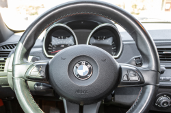 2008 BMW Z4 M Coupe in Alpine White III over Imola Red Nappa