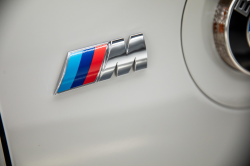 2008 BMW Z4 M Coupe in Alpine White III over Imola Red Nappa