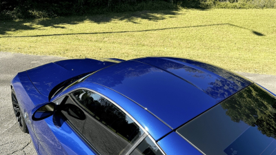 2008 BMW Z4 M Coupe in Interlagos Blue Metallic over Imola Red Nappa